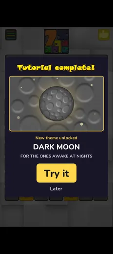 The "Tutorial complete" card unlocking the Dark Moon theme.